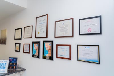 credentials lining the walls at Dental Beauty in Feasterville, PA
