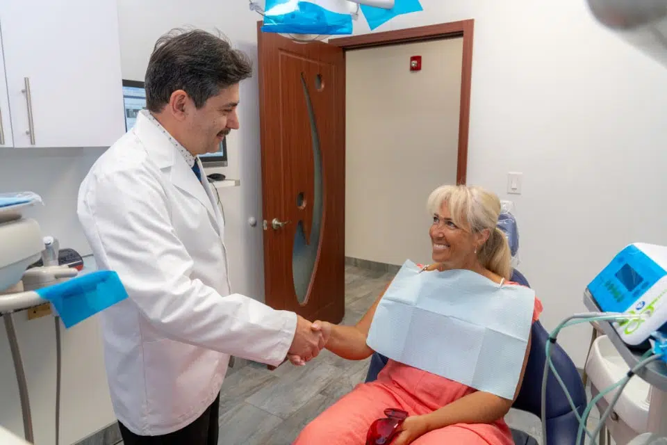 Feasterville, PA dentist Dr. Andrey Kurudimov talking with a patient at Dental Beauty